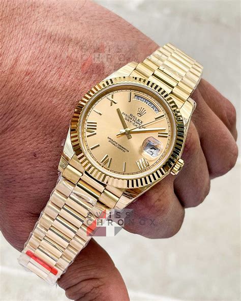 rolex day date 40 yellow gold.